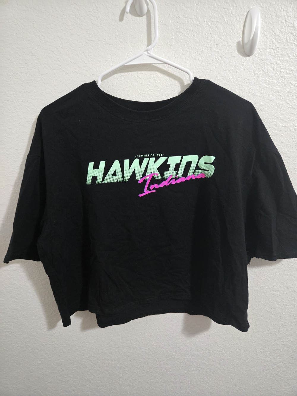 Stranger Things | Black Crop Tee with Mint & Pink 'Hawkins' Graphic